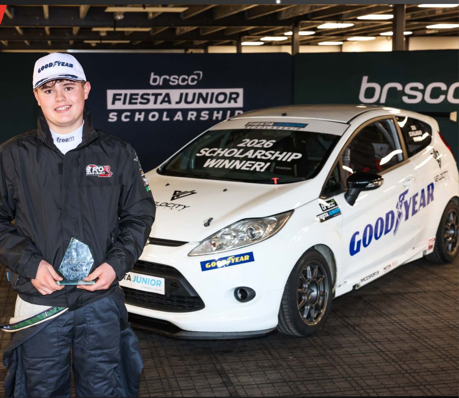 Rhys Owen with his 2026 Scholarship Winner car and trophy